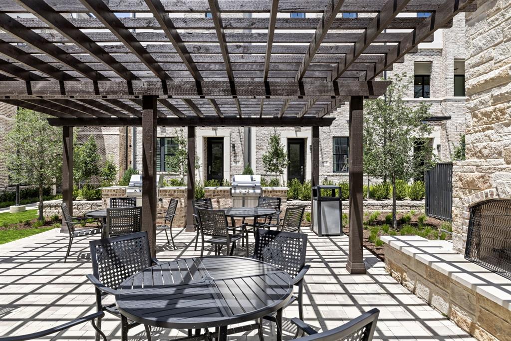 5461 Patterson Court Irving, TX 75039 - Photo 3 of 40 a view of a patio with dining table and chairs