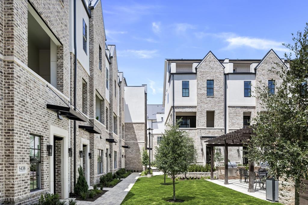 5461 Patterson Court Irving, TX 75039 - Photo 4 of 40 a front view of a residential apartment building with a yard