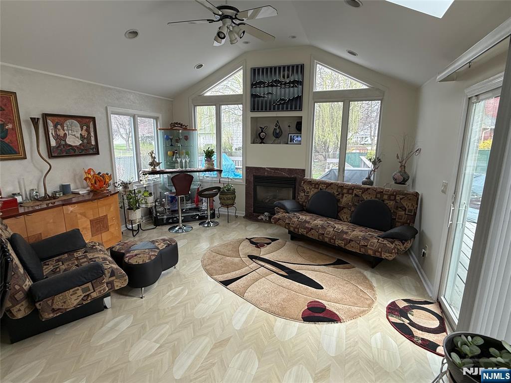 21 A Millar Court Paramus, NJ 07652 - Photo 2 of 24 a living room with furniture window and a fireplace
