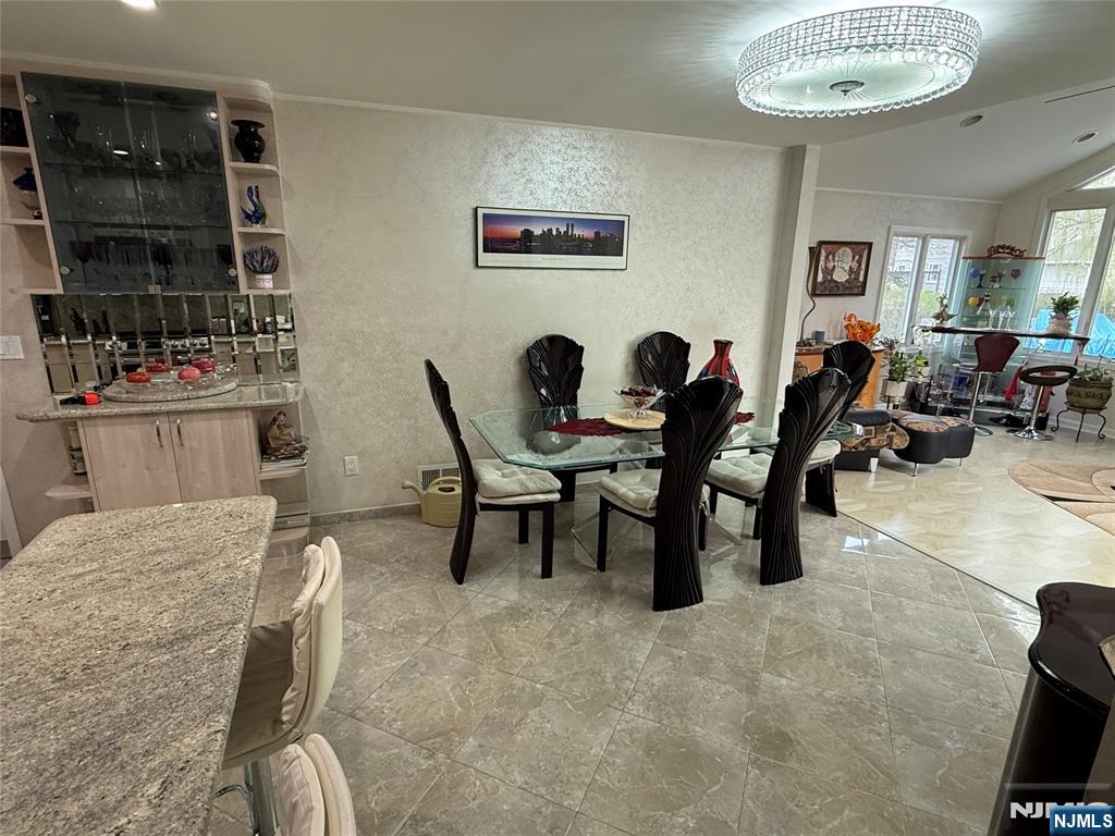 21 A Millar Court Paramus, NJ 07652 - Photo 4 of 24 a view of a dining room with furniture