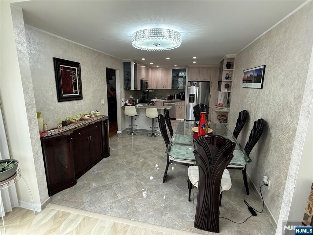 21 A Millar Court Paramus, NJ 07652 - Photo 5 of 24 a view of a dining room with furniture