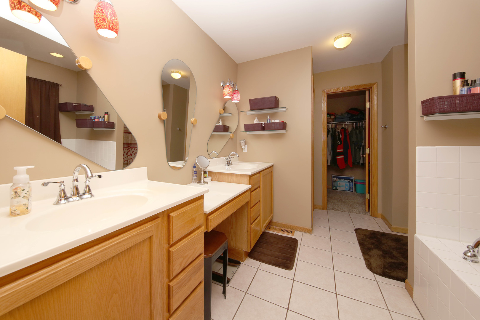 700 East Southmor Road Morris, IL 60450 - Photo 13 of 22 a bathroom with a sink vanity and mirror