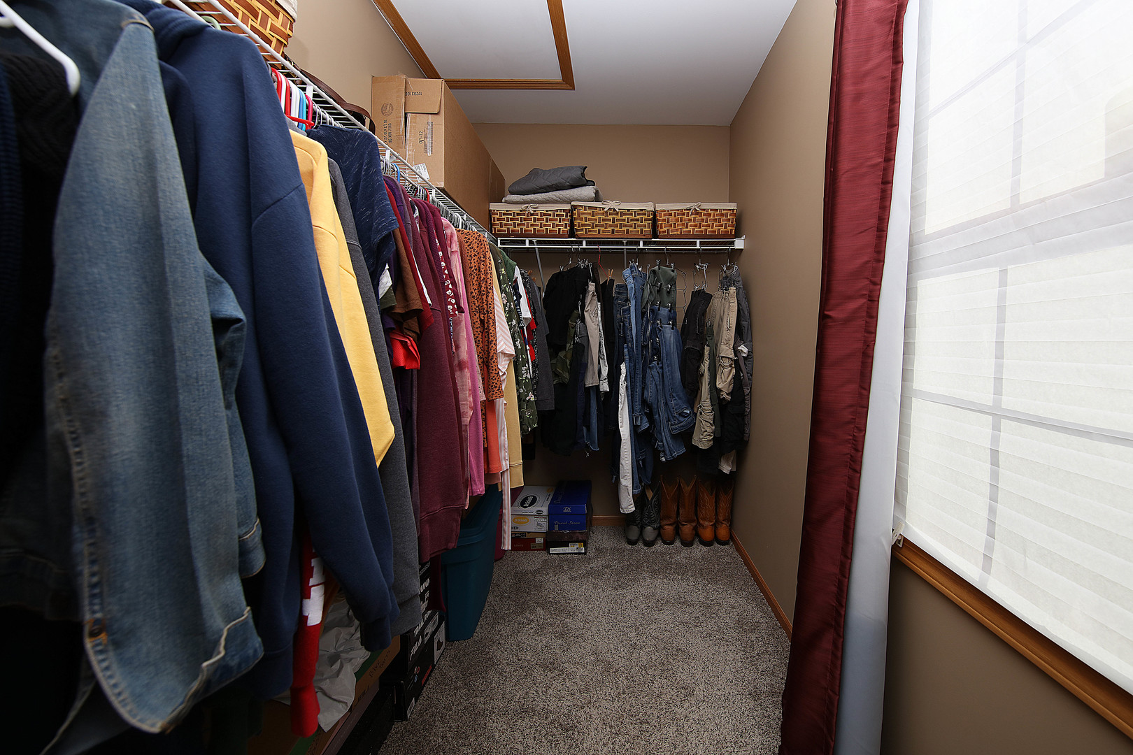 700 East Southmor Road Morris, IL 60450 - Photo 14 of 22 a view of walk in closet with clothes