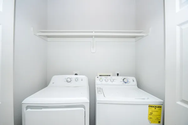 a utility room with dryer and washer