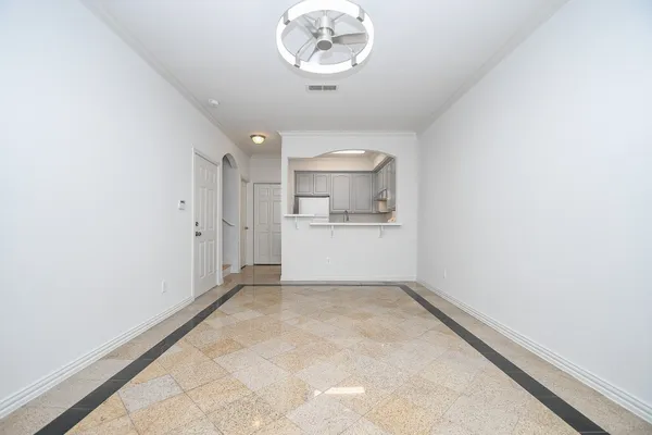 a view of a kitchen with a sink and a window