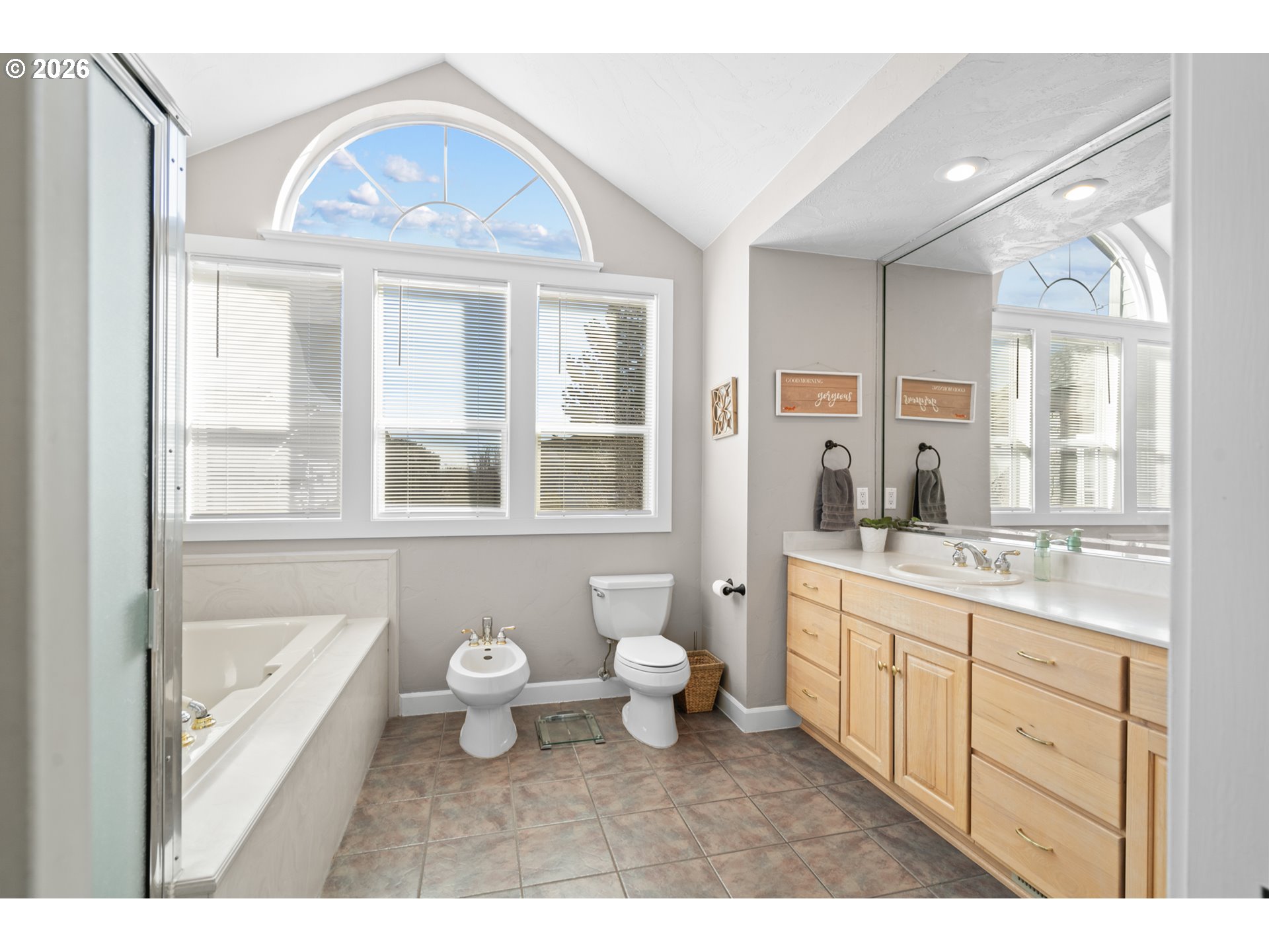 1741 Southwest 18th Street Pendleton, OR 97801 - Photo 16 of 38 a bathroom with a granite countertop sink mirror and a toilet