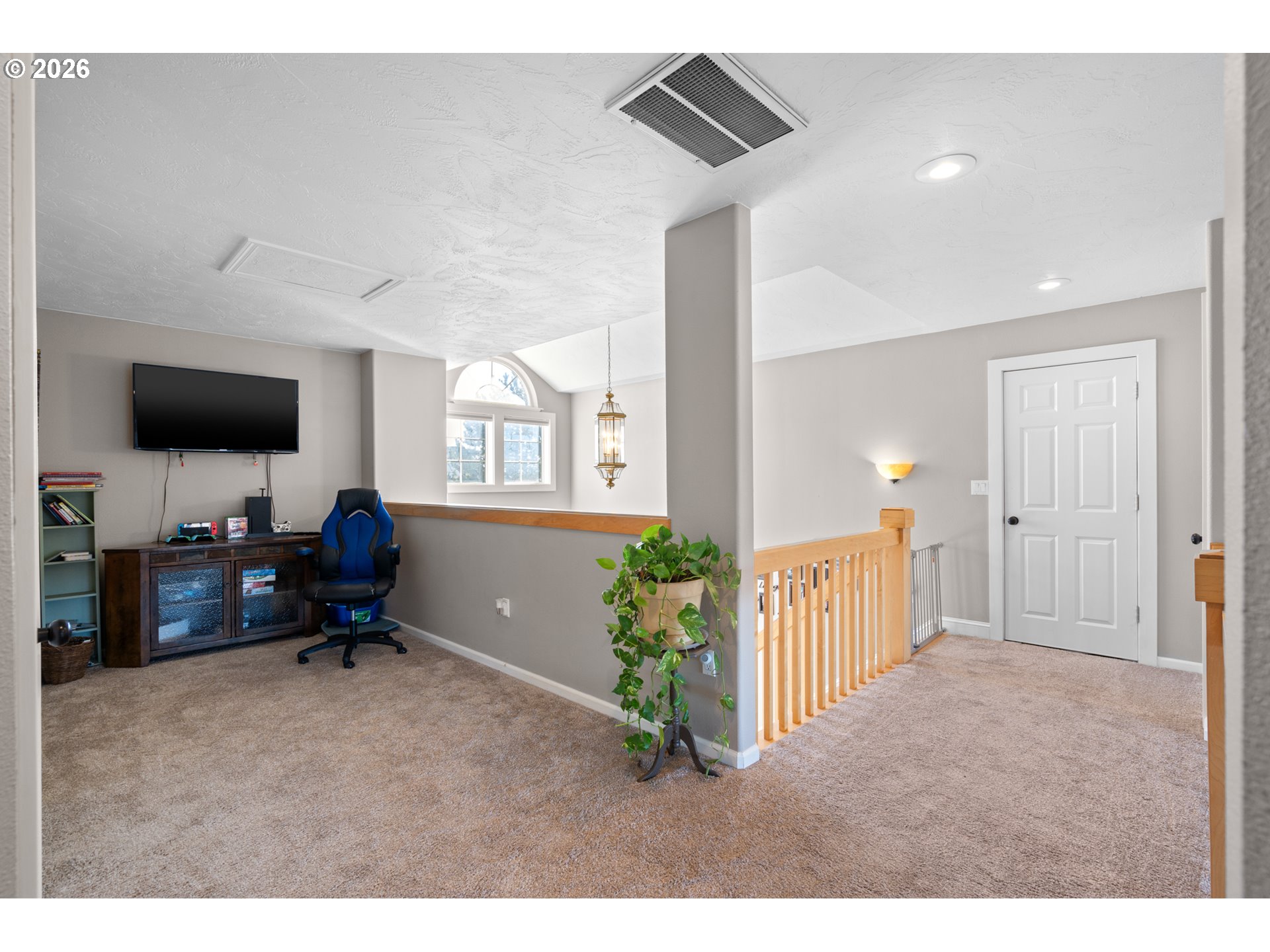 1741 Southwest 18th Street Pendleton, OR 97801 - Photo 20 of 38 a living room with furniture and a flat screen tv
