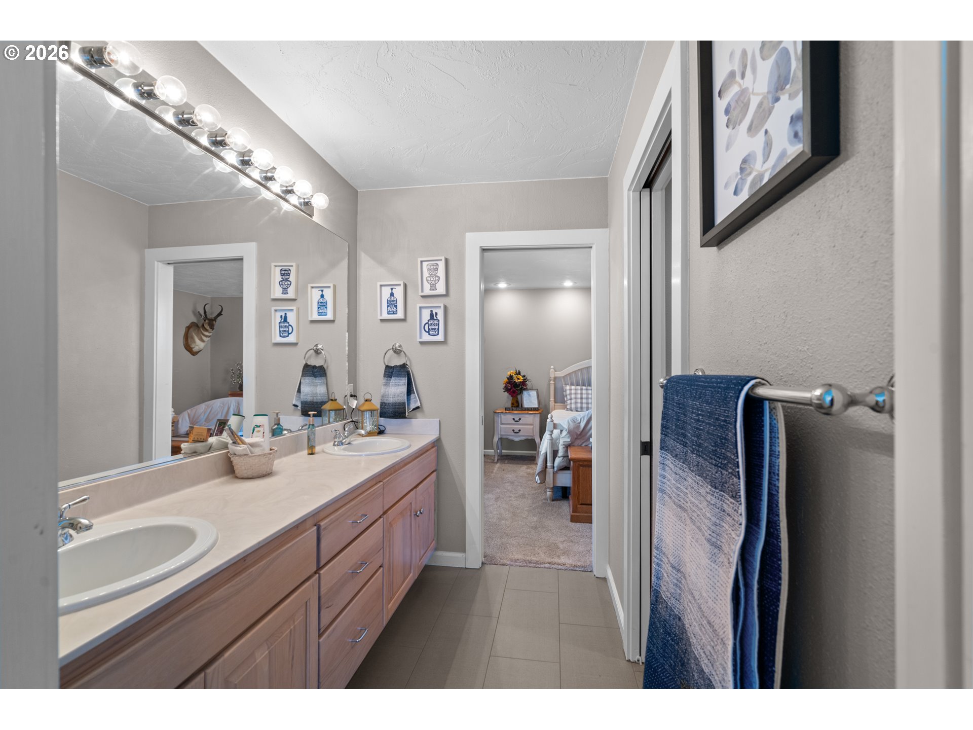 1741 Southwest 18th Street Pendleton, OR 97801 - Photo 24 of 38 a bathroom with a sink a mirror and a shower