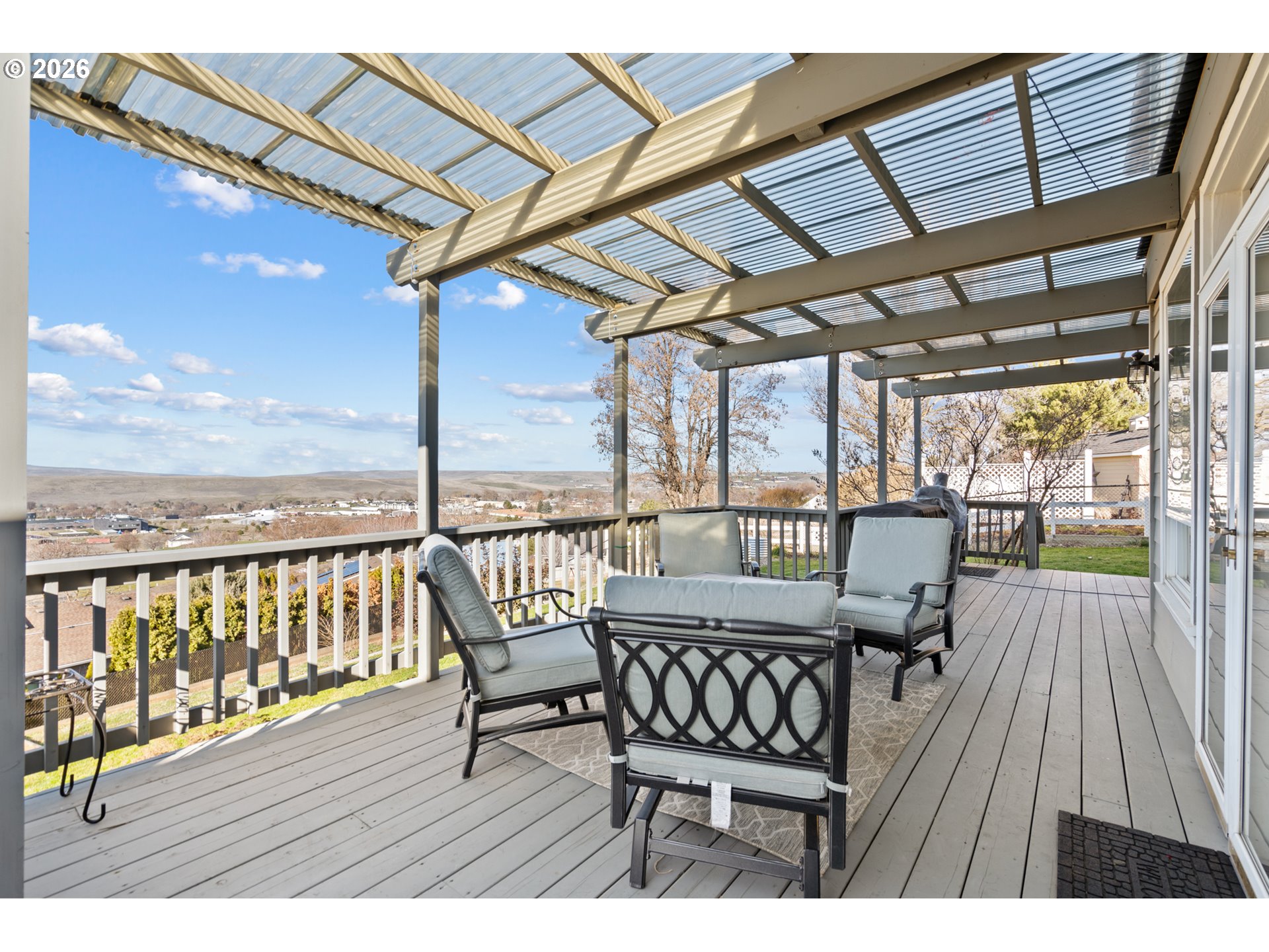 1741 Southwest 18th Street Pendleton, OR 97801 - Photo 26 of 38 a view of a balcony with furniture and wooden floor