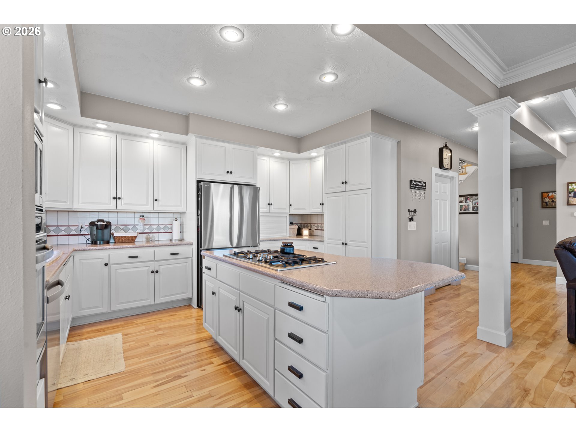 1741 Southwest 18th Street Pendleton, OR 97801 - Photo 10 of 38 a kitchen with white cabinets sink and refrigerator