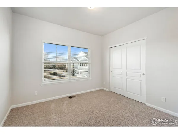 a bathroom with a sink vanity and a mirror