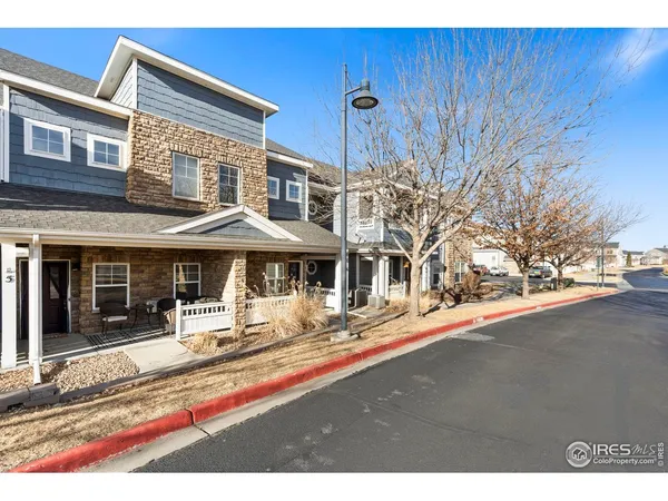 a front view of a house with a porch