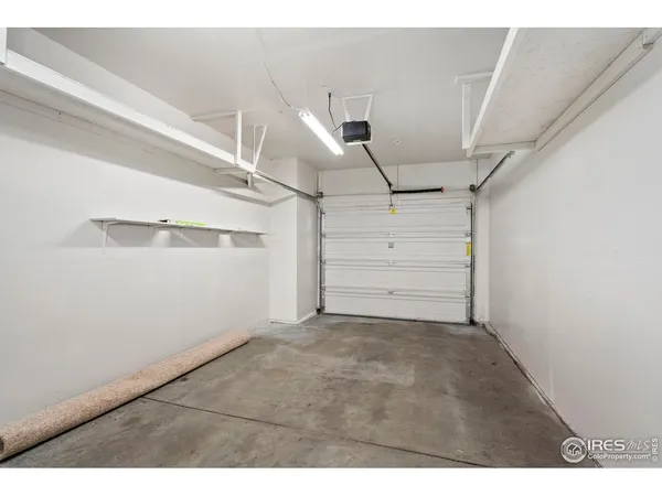 a view of a house with snow on the road