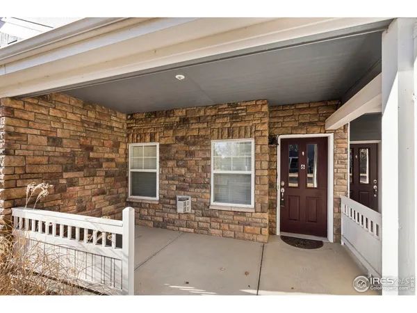 a view of a porch with furniture