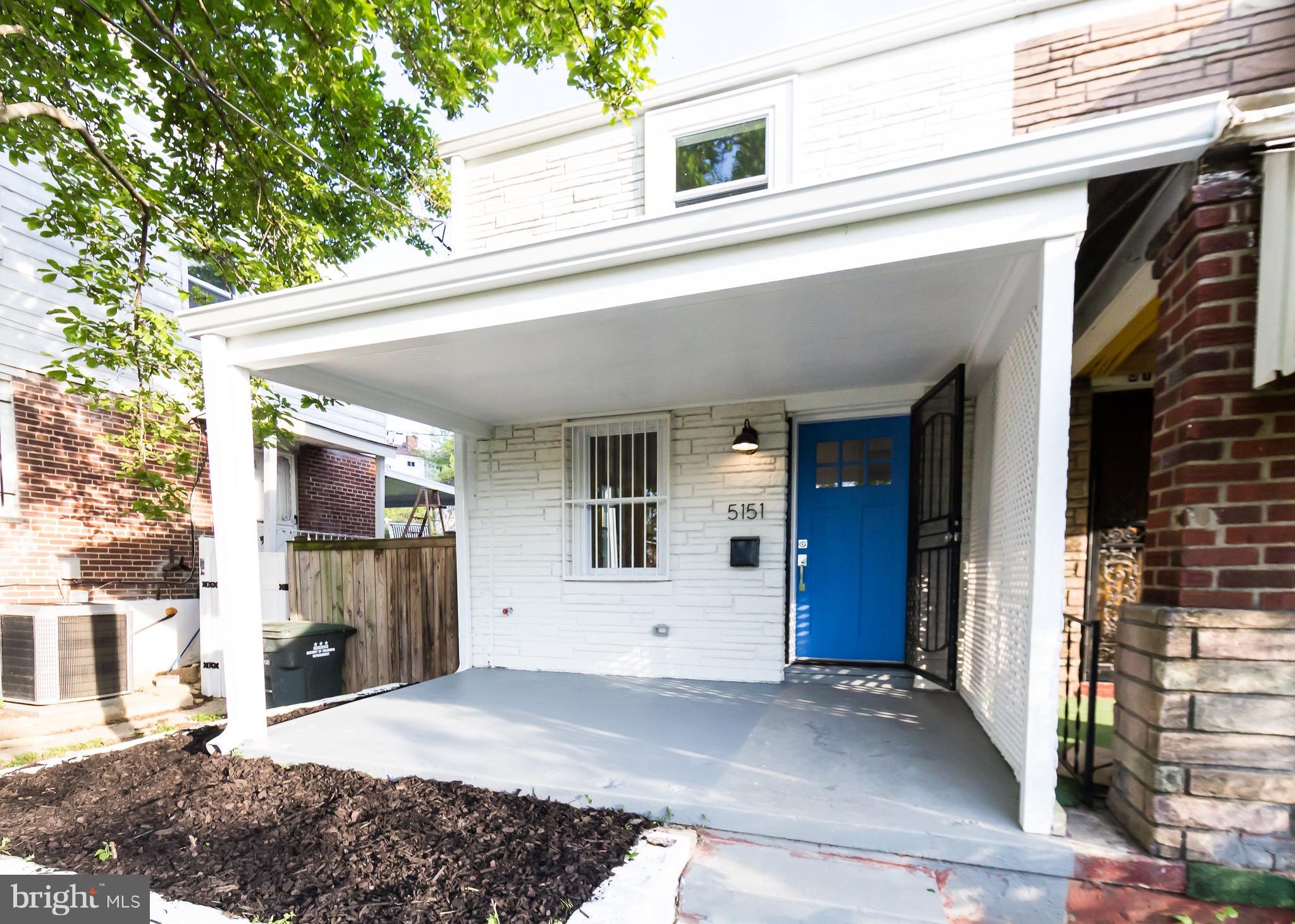 5151 Sheriff Road Northeast Washington, DC 20019 - Photo 2 of 20 a view of a house with a patio