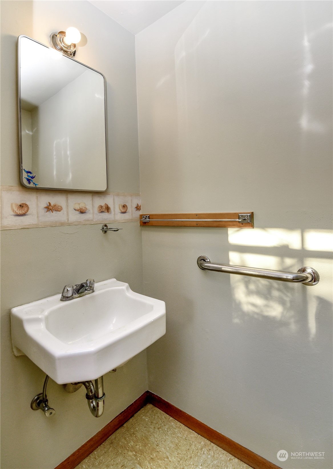 272 Hinkleman Road Buckley, WA 98321 - Photo 27 of 37 a bathroom with a sink a mirror and a toilet