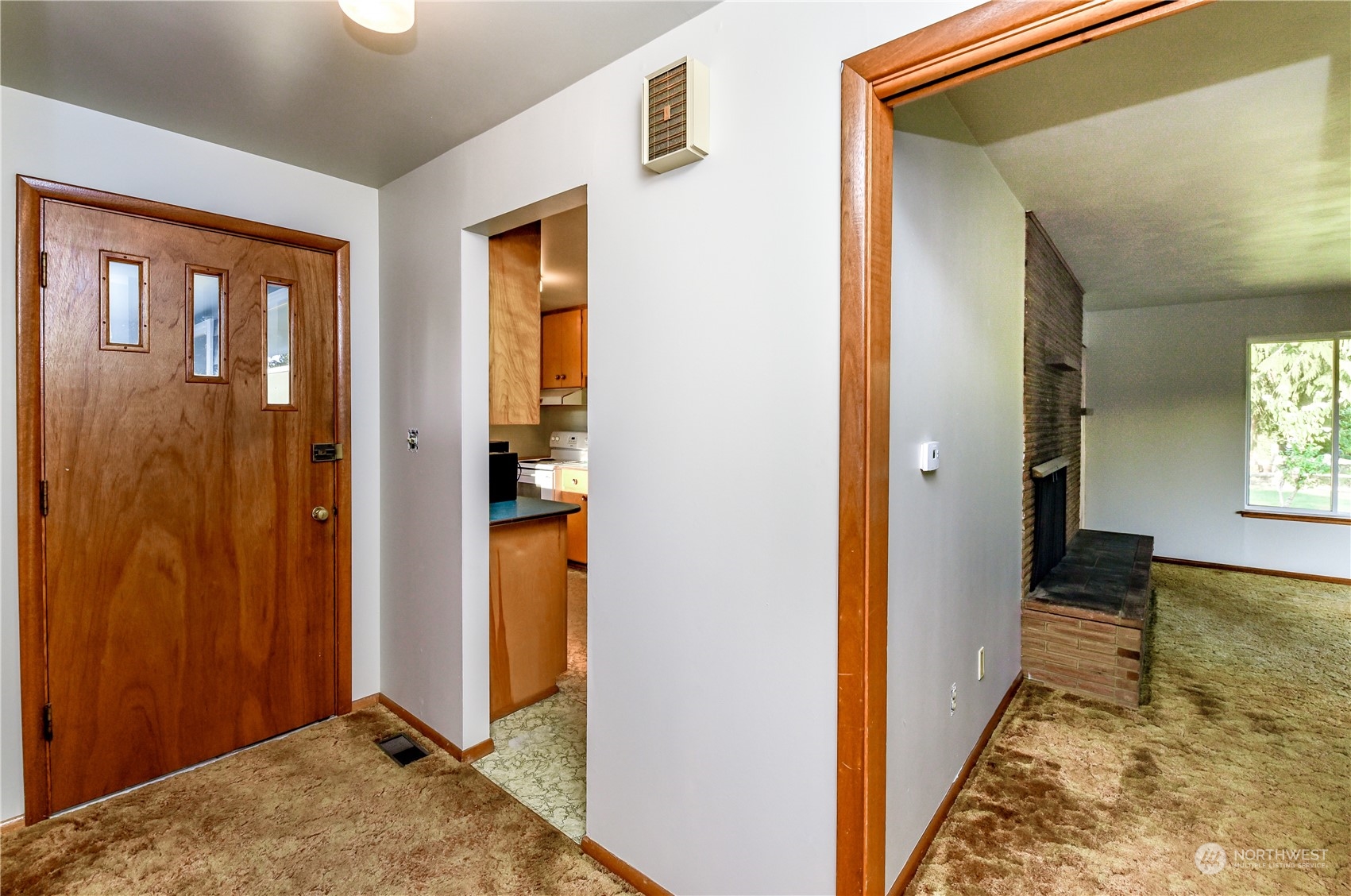 272 Hinkleman Road Buckley, WA 98321 - Photo 5 of 37 wooden floor with a bedroom and windows