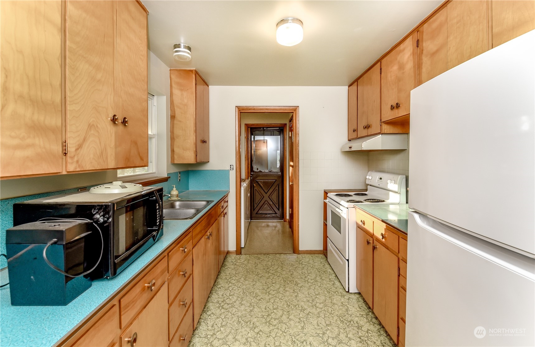 272 Hinkleman Road Buckley, WA 98321 - Photo 9 of 37 a kitchen with stainless steel appliances granite countertop a stove and a refrigerator