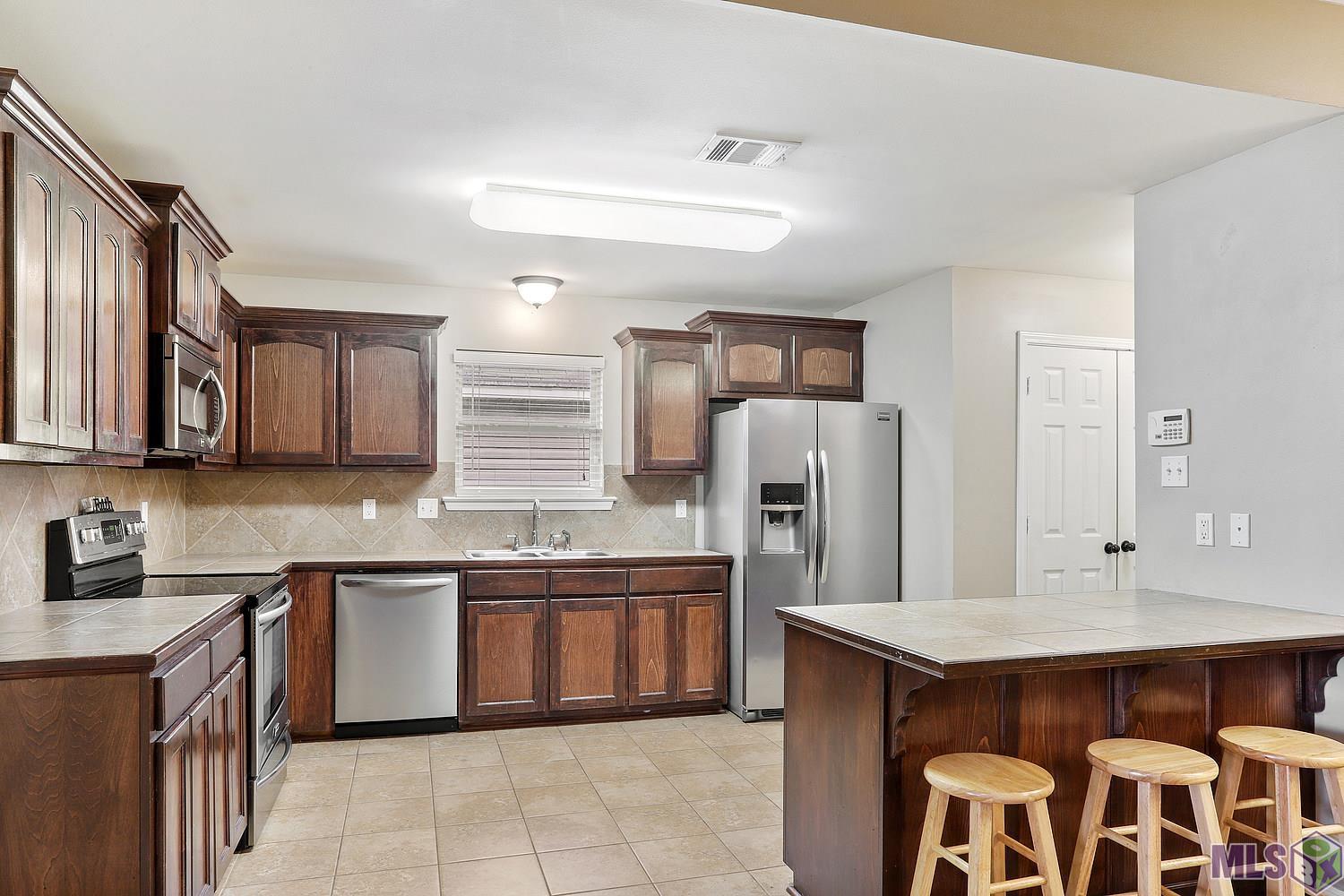 9401 Lockhart Road Denham Springs, LA 70726 - Photo 5 of 14 Gallery Image 5
