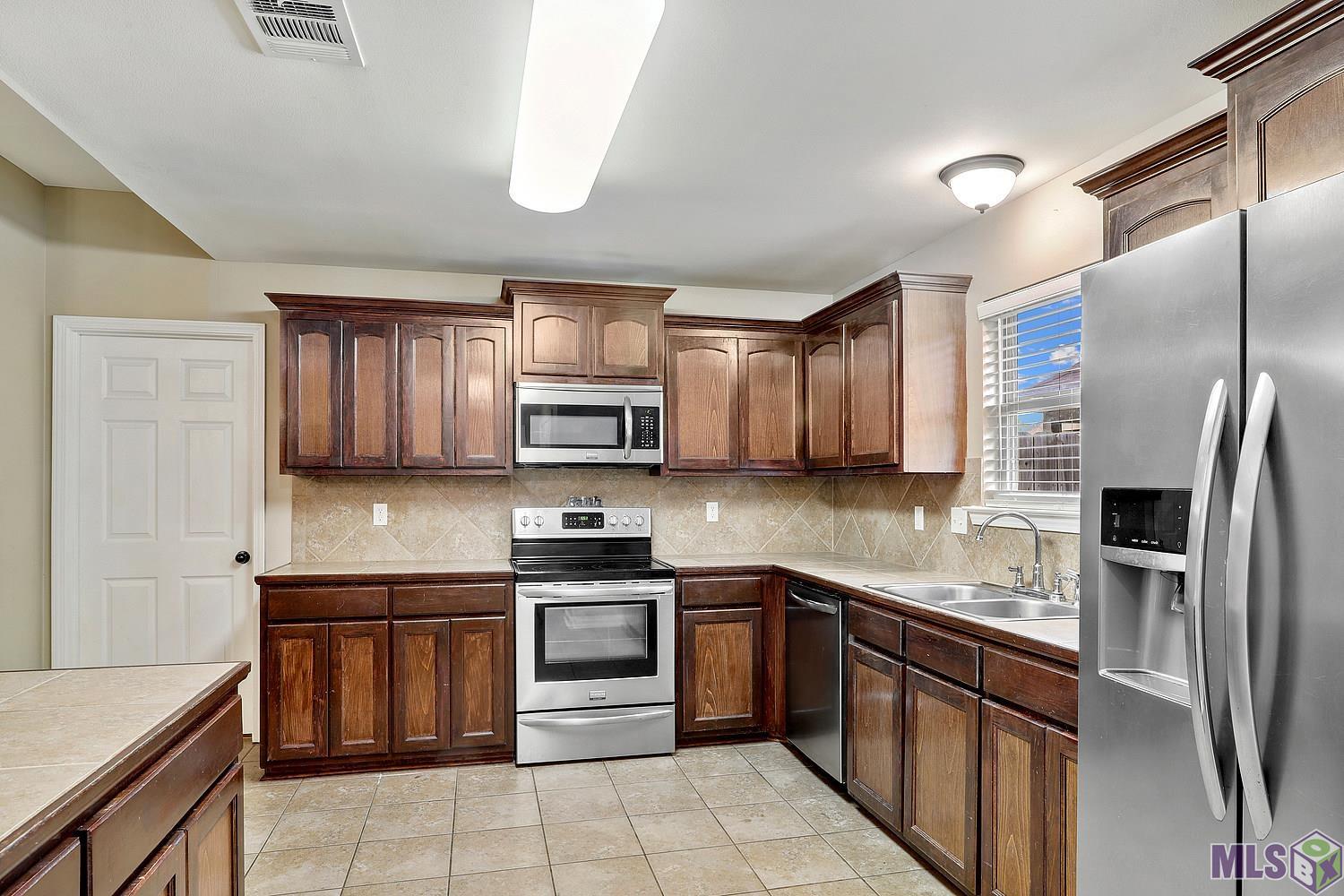 9401 Lockhart Road Denham Springs, LA 70726 - Photo 6 of 14 Gallery Image 6