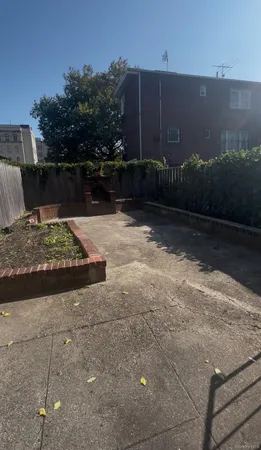 a view of backyard with green space