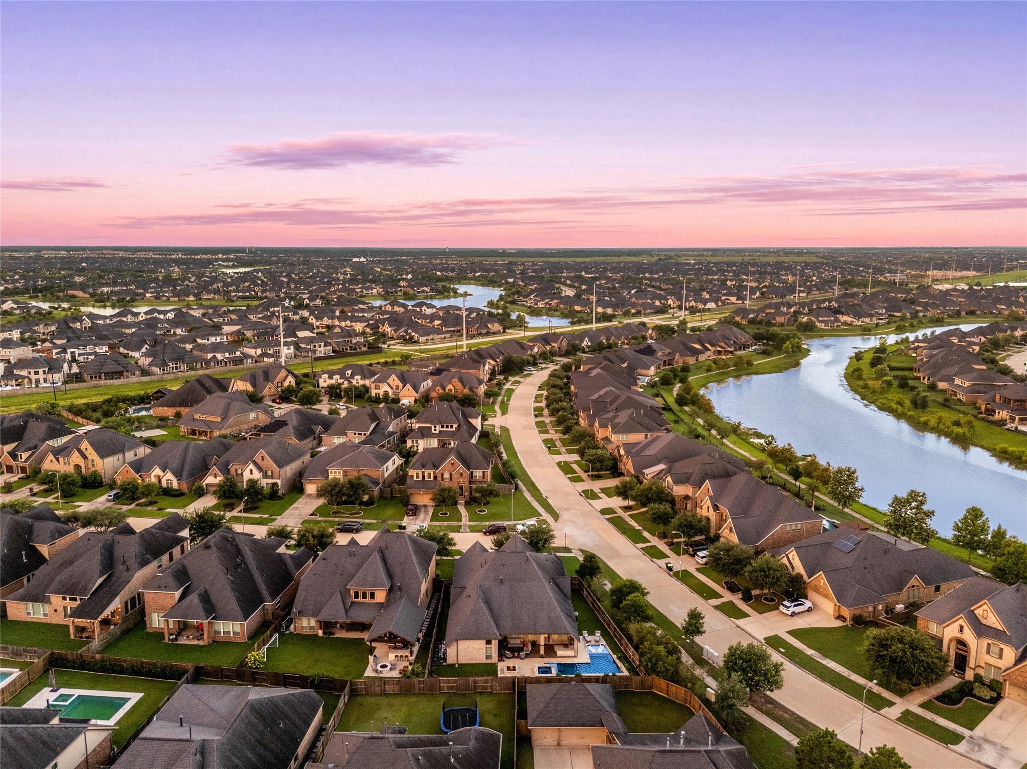 4103 August Light Court Fulshear, TX 77441 - Photo 28 of 33 an aerial view of residential houses with outdoor space