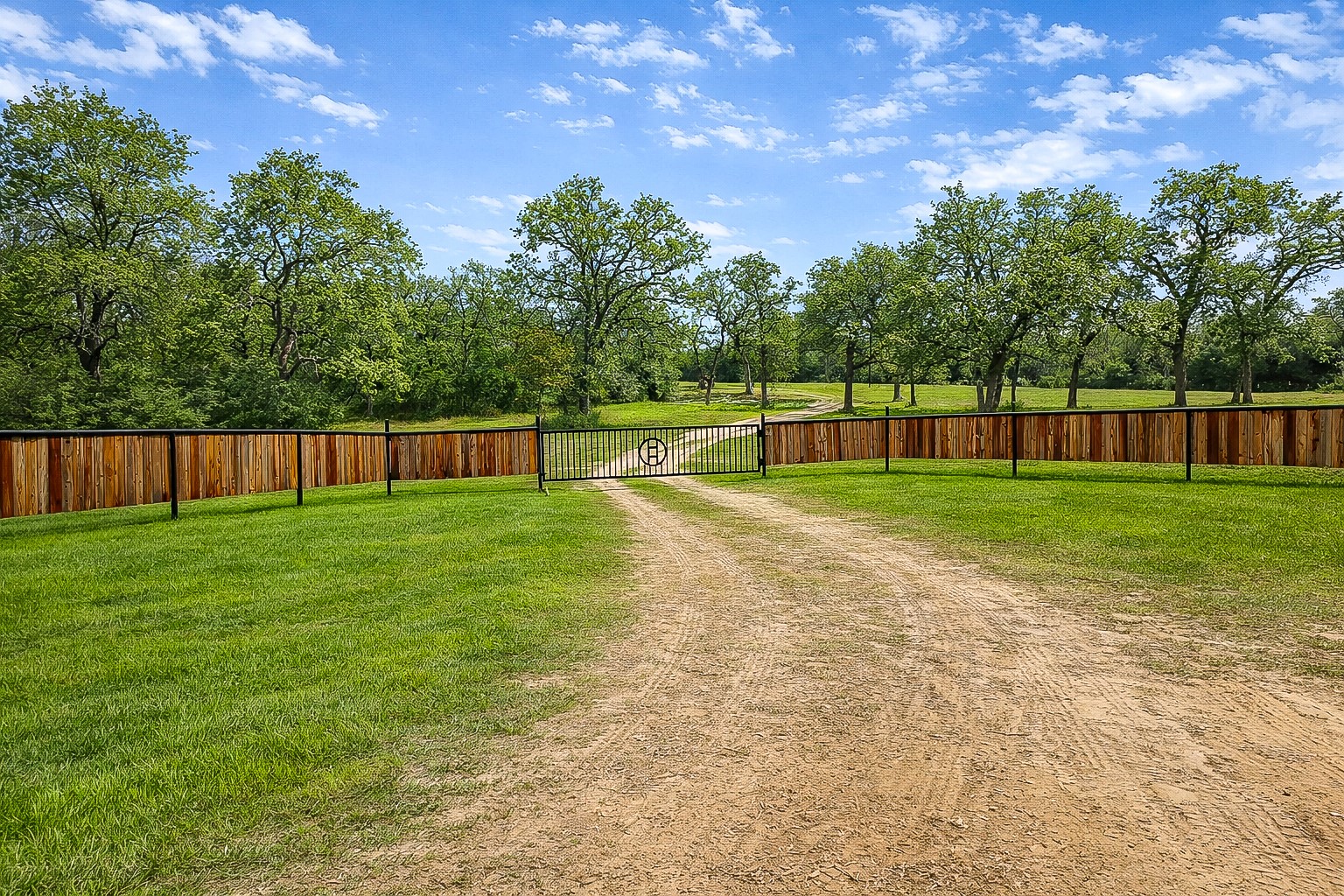 a swimming pool with wooden fence