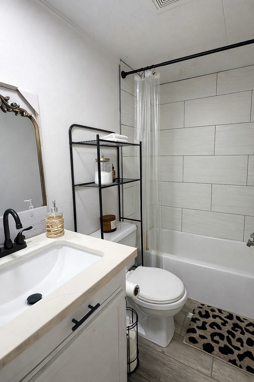 7031 Red Rock Road Franklin, TX 77856 - Photo 13 of 17 a bathroom with a sink a toilet a mirror and shower