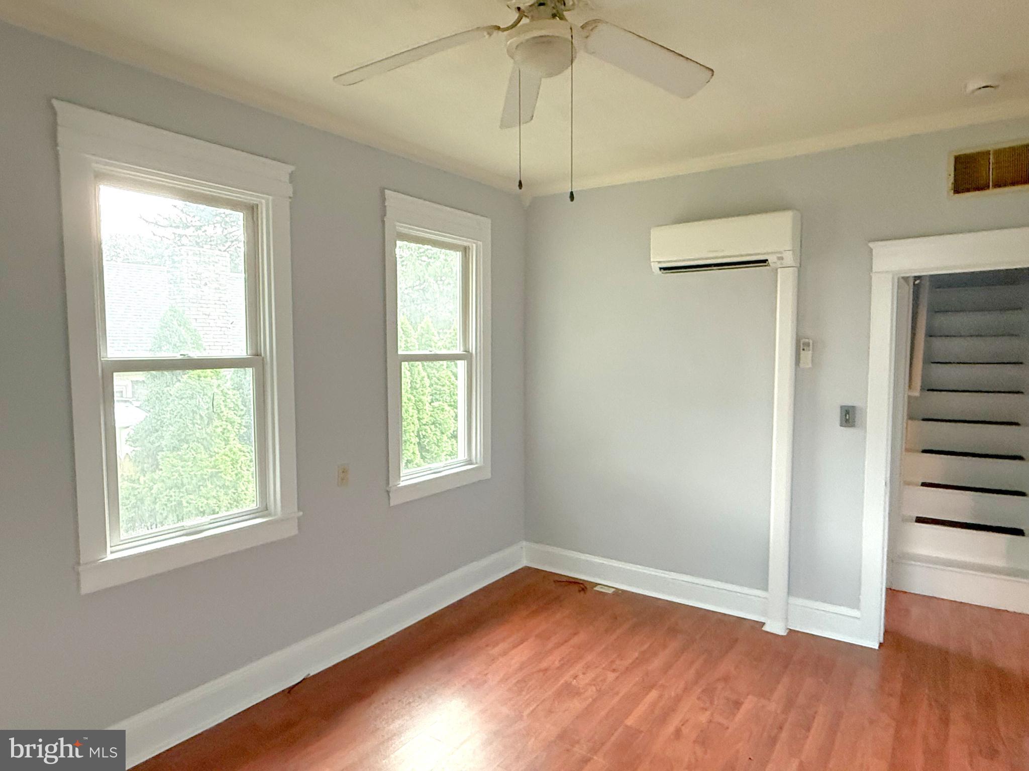 13579 Summit Avenue Blue Ridge Summit, PA 17214 - Photo 11 of 18 a view of an empty room with wooden floor and a window