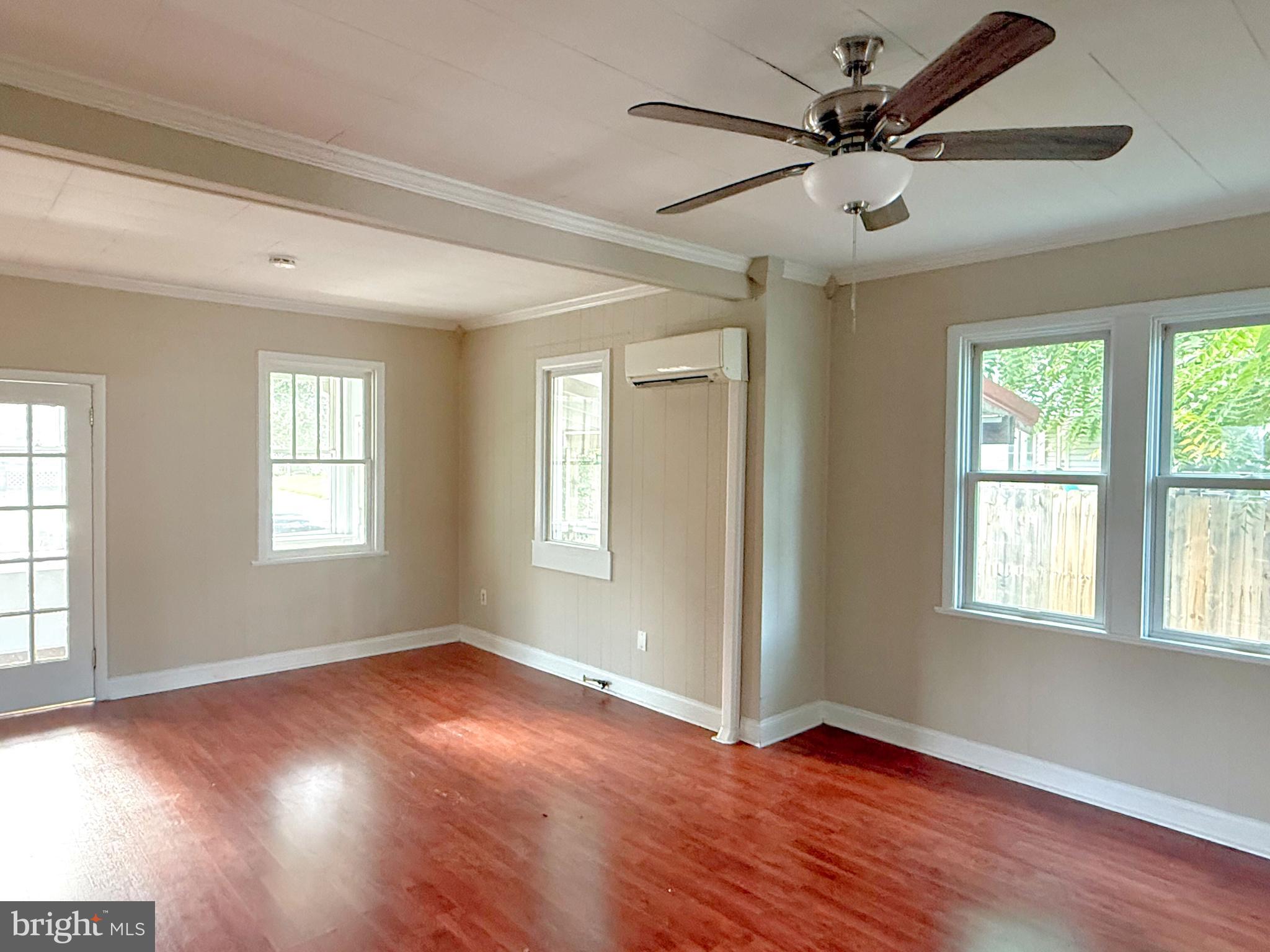 13579 Summit Avenue Blue Ridge Summit, PA 17214 - Photo 5 of 18 a view of an empty room with wooden floor and a window