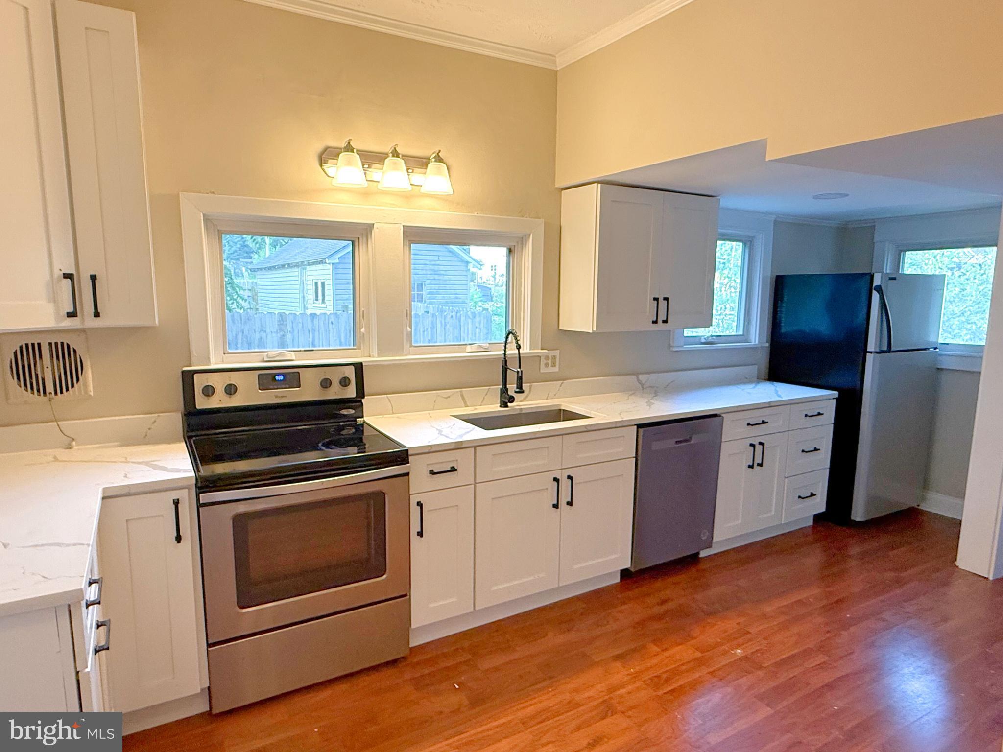 13579 Summit Avenue Blue Ridge Summit, PA 17214 - Photo 7 of 18 a kitchen with a stove oven and sink