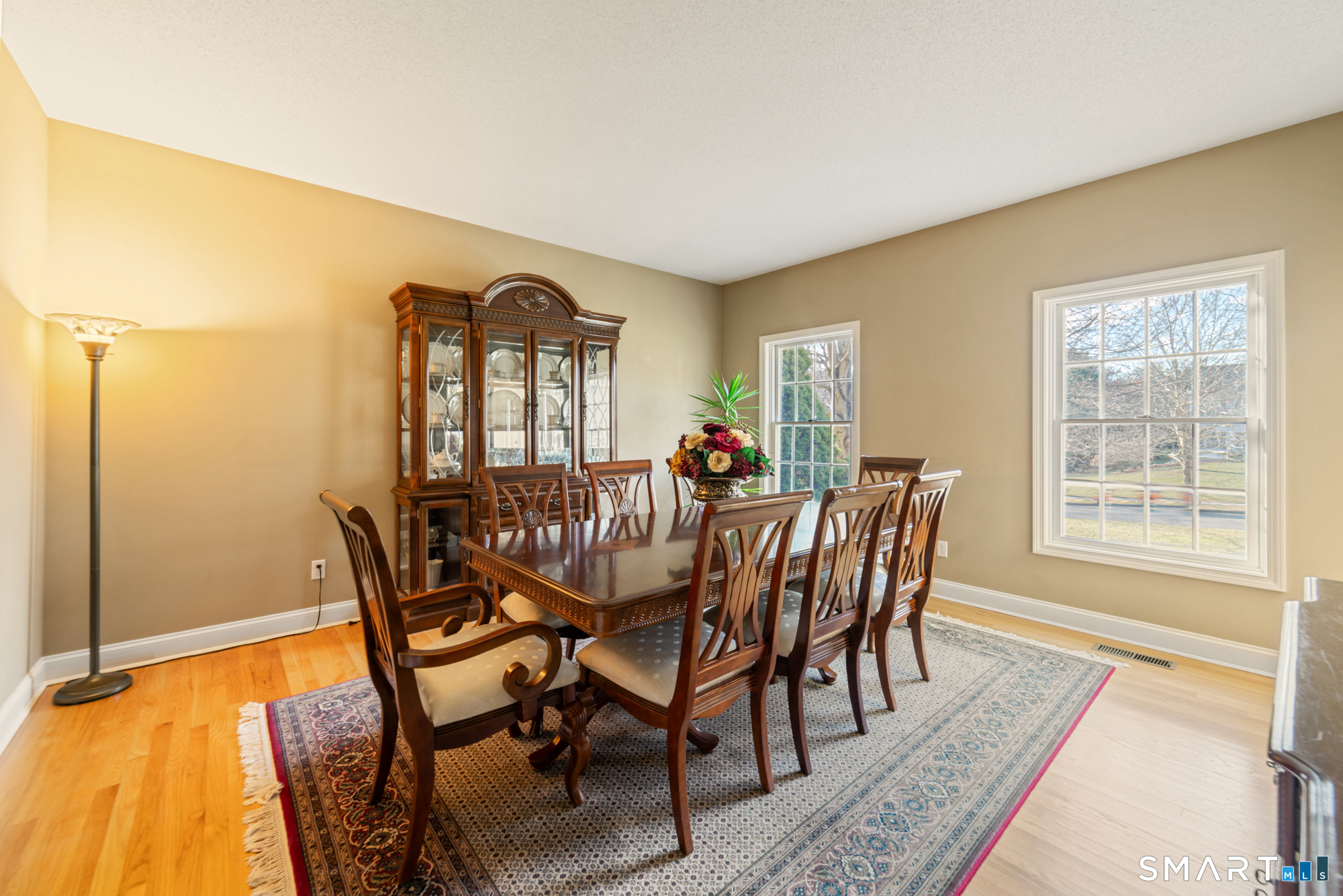 23 Mountain Pond Road Southington, CT 06489 - Photo 13 of 39 a view of a dining room with furniture and wooden floor