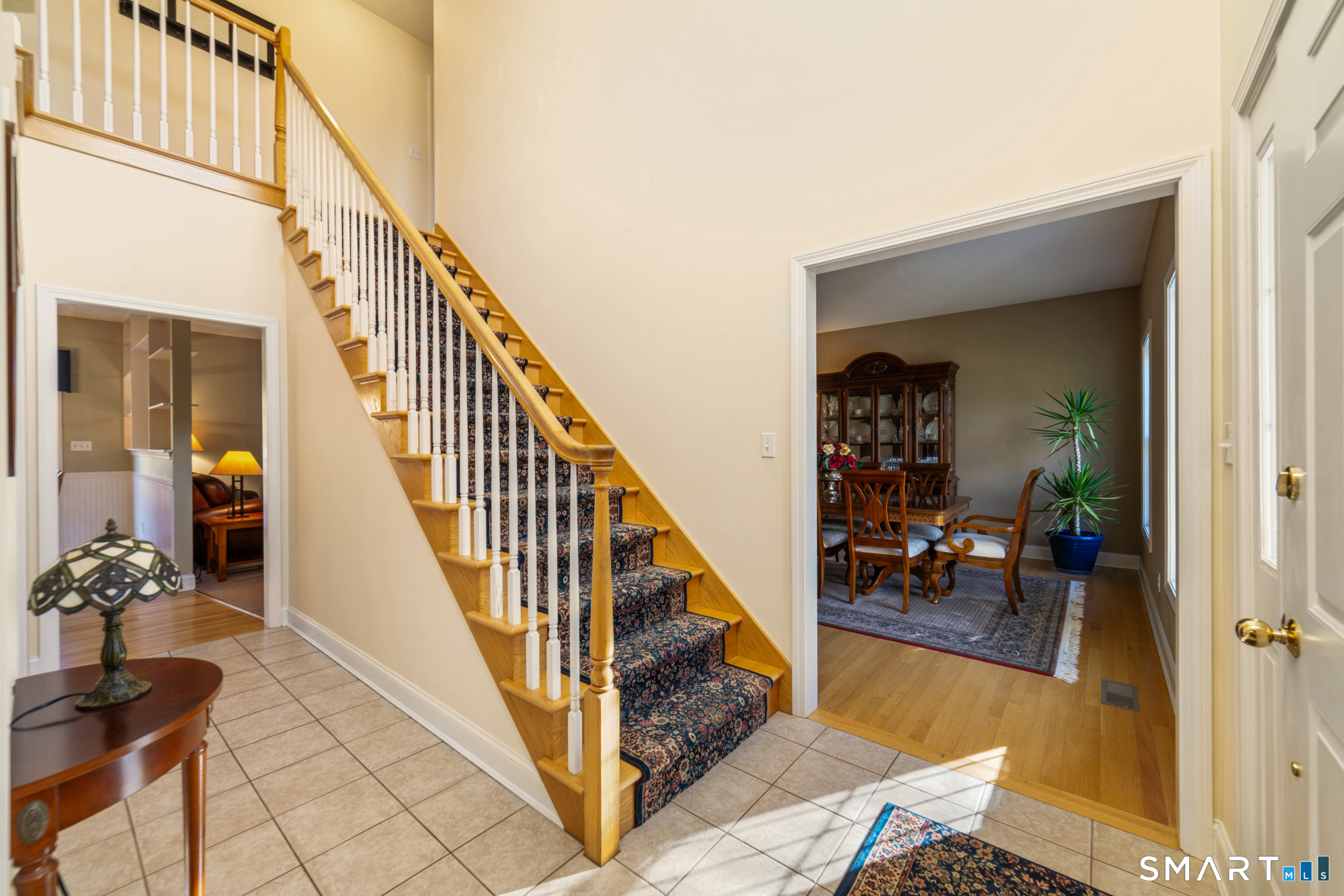 23 Mountain Pond Road Southington, CT 06489 - Photo 16 of 39 a view of staircase with furniture and a potted plant