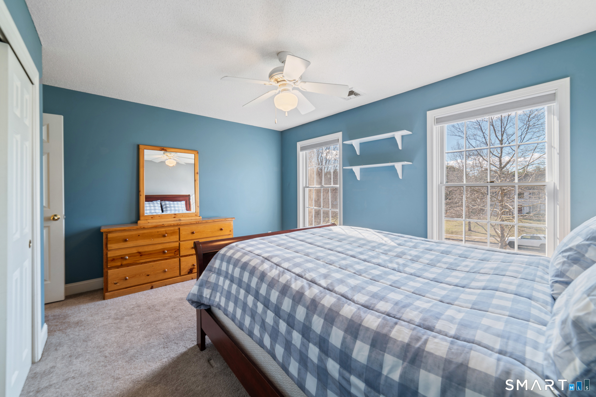 23 Mountain Pond Road Southington, CT 06489 - Photo 25 of 39 a bedroom with a bed and a dresser