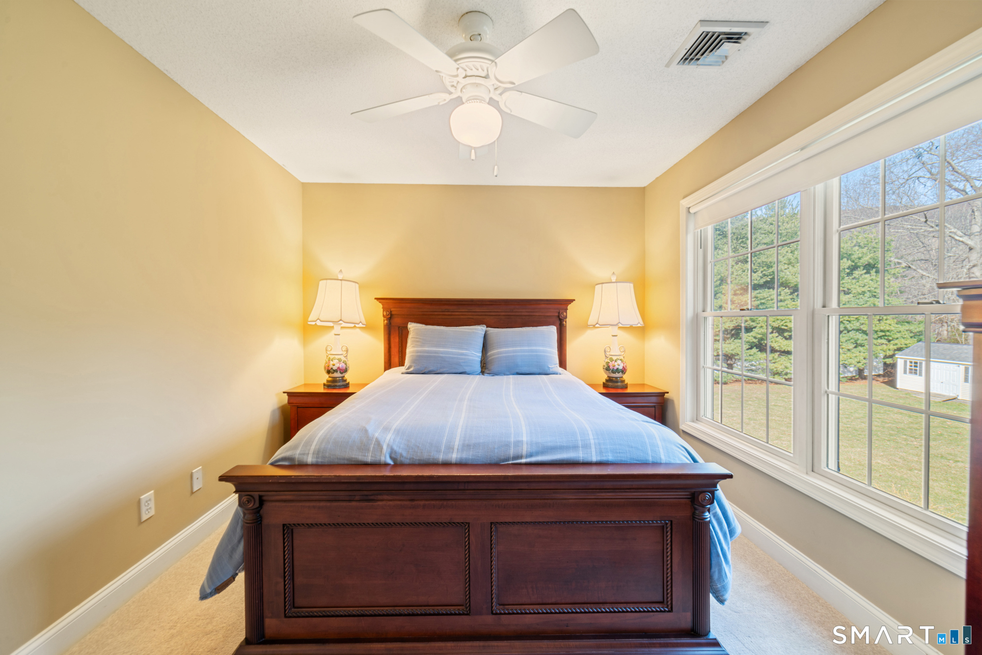 23 Mountain Pond Road Southington, CT 06489 - Photo 26 of 39 a bedroom with a bed and a large window with outer view