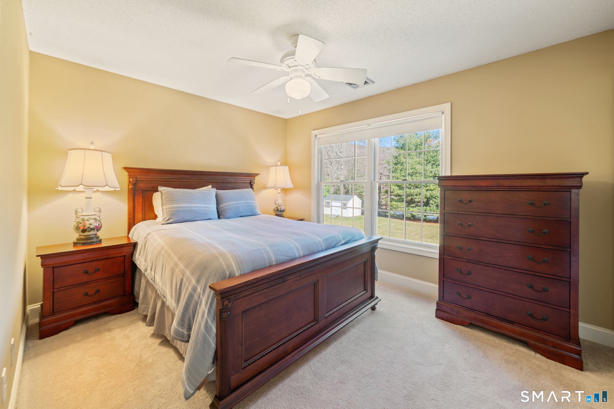 23 Mountain Pond Road Southington, CT 06489 - Photo 27 of 39 a spacious bedroom with a bed and a dresser
