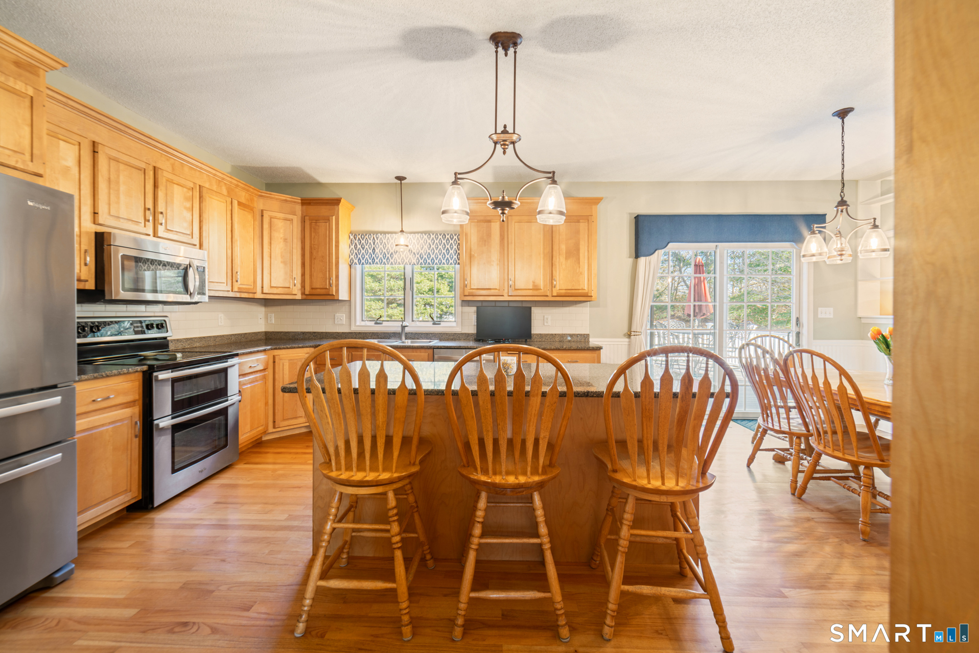 23 Mountain Pond Road Southington, CT 06489 - Photo 5 of 39 a view of a dining room with furniture window and outside view