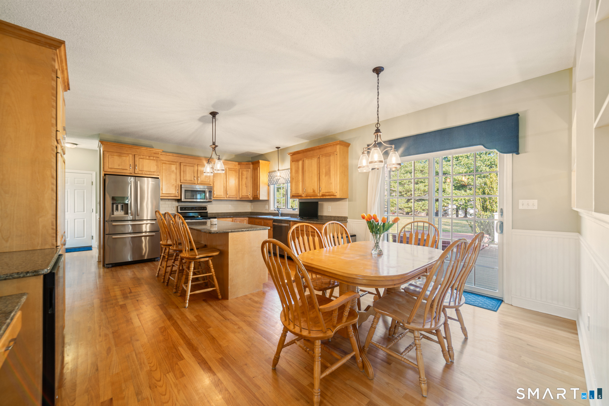23 Mountain Pond Road Southington, CT 06489 - Photo 6 of 39 a dining room with furniture window and wooden floor