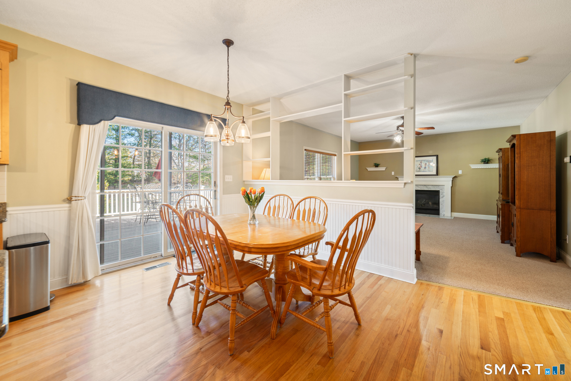 23 Mountain Pond Road Southington, CT 06489 - Photo 9 of 39 a dining room with furniture a chandelier and wooden floor