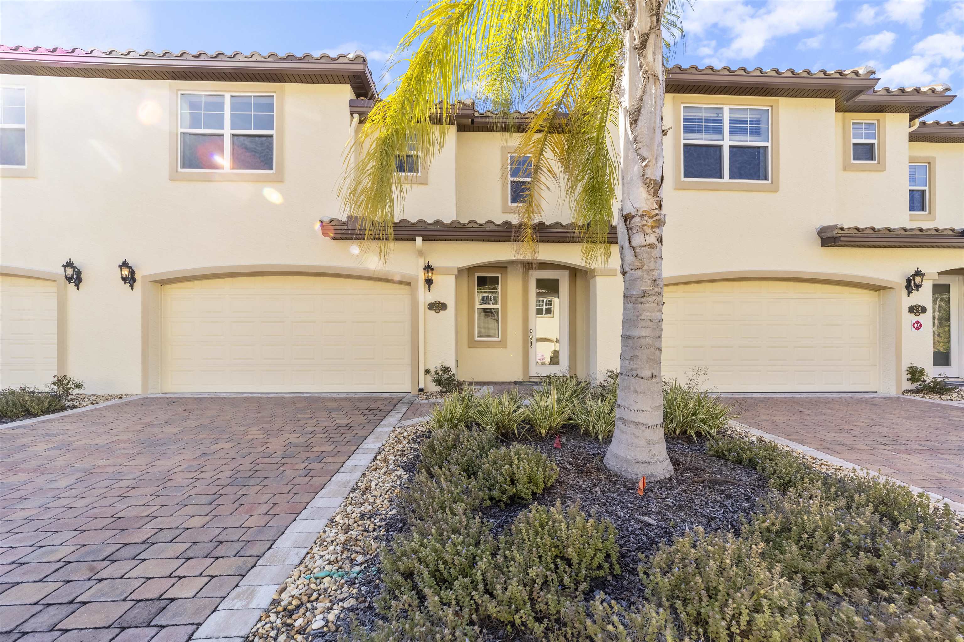 255 Grand Ravine Drive St. Augustine, FL 32086 - Photo 22 of 25 a front view of a house with a yard and garage