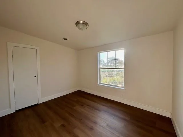 a view of an empty walk in closet