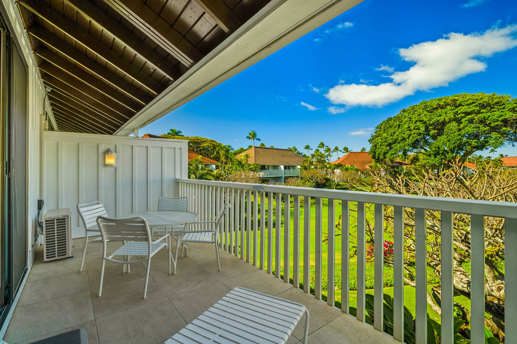 2253 Poipu Road, Unit 55 Koloa, HI 96756 - Photo 13 of 21 a view of a chairs and table in the balcony