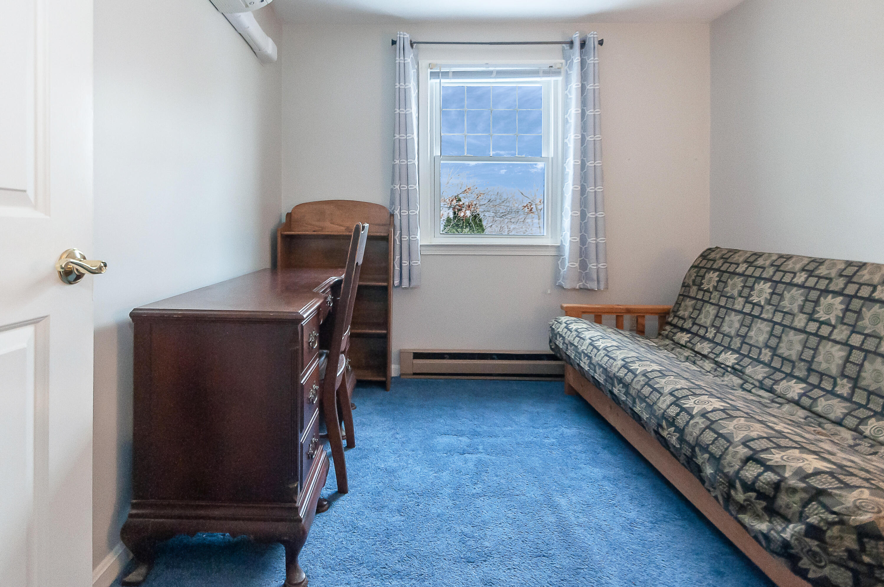 36 Atkins Road, Unit E6 East Sandwich, MA 02537 - Photo 15 of 30 a bedroom with a bed and a window