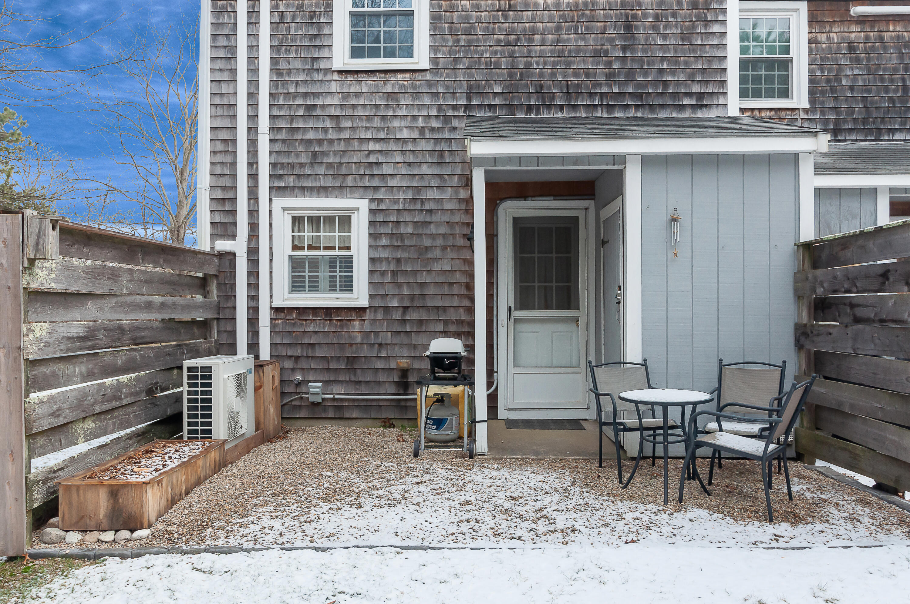36 Atkins Road, Unit E6 East Sandwich, MA 02537 - Photo 18 of 30 a view of a outdoor space with a lounge chair