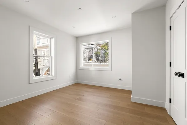 an empty room with windows