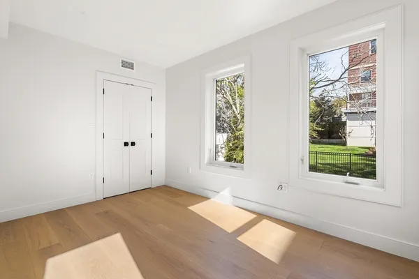 a view of a room that has a window in it