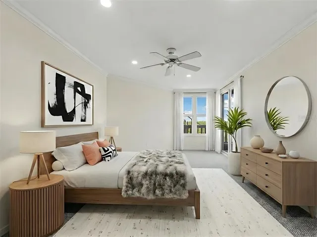 a bedroom with a bed and a dresser