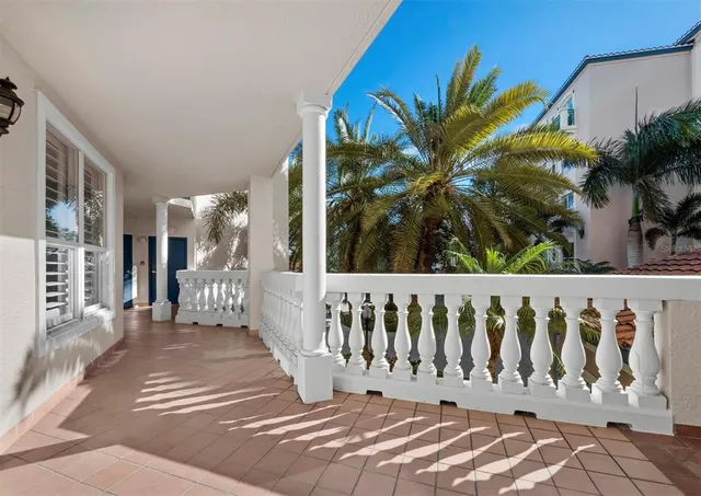 a view of a wooden door and a window
