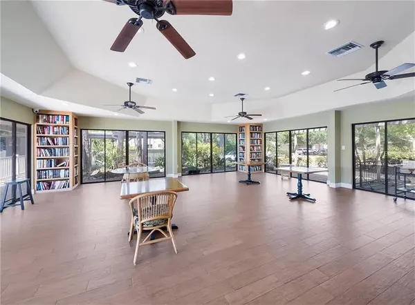 a view of a lobby with furniture and floor to ceiling window