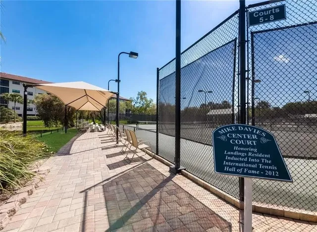 a view of a street with sitting area